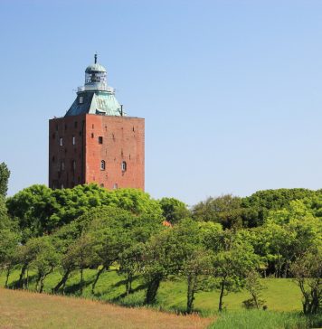 Eine frische Brise und viel Geschichte atmen: der Leuchtturm Neuwerk Was viele nicht wissen - der Leuchtturm Neuwerk ist das älteste gebäude Hamburgs. Bildquelle: Shutterstock.com